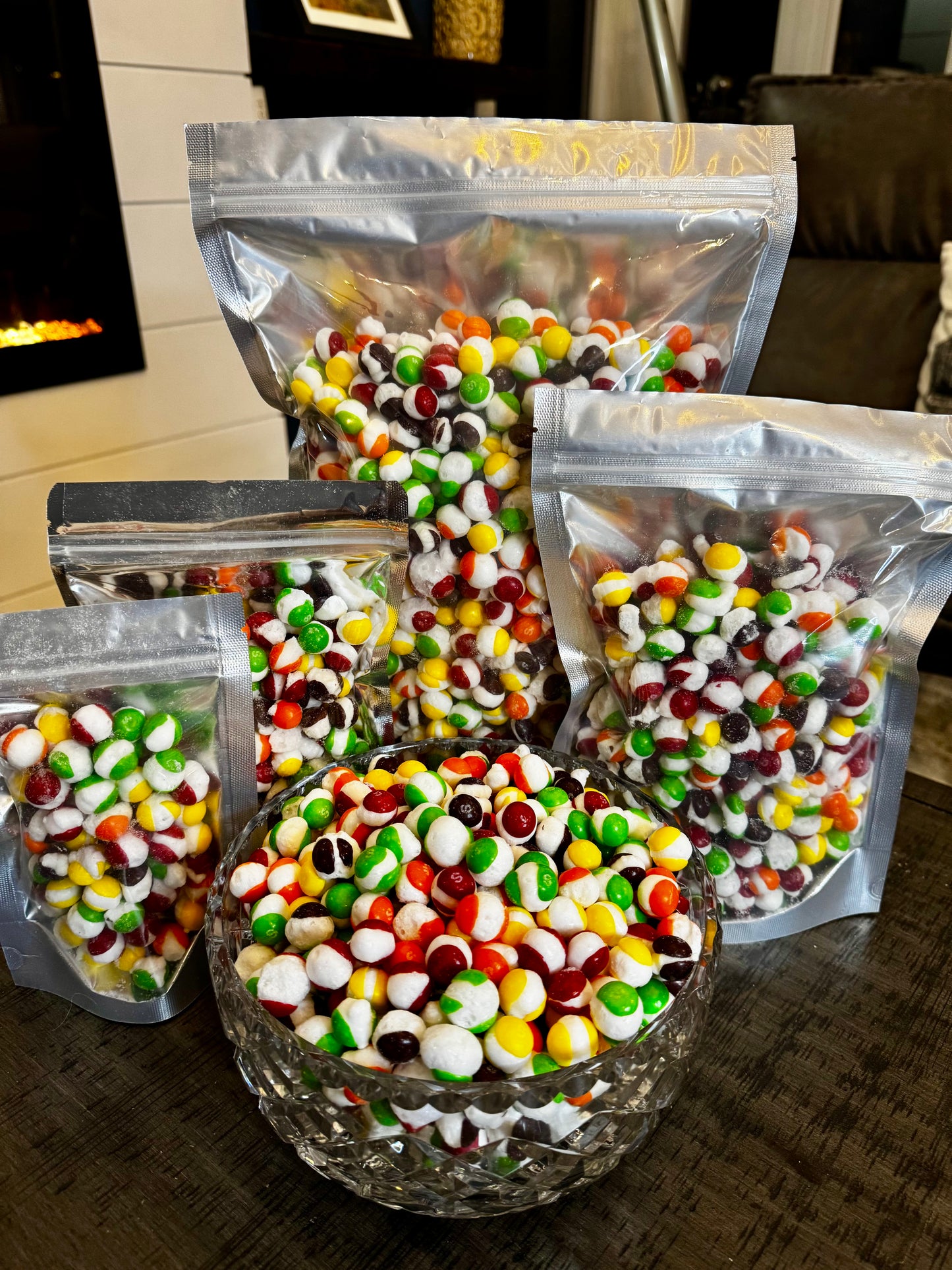 Standing Bags of Freeze Dried Skittles Candy set up in a display to show the product.