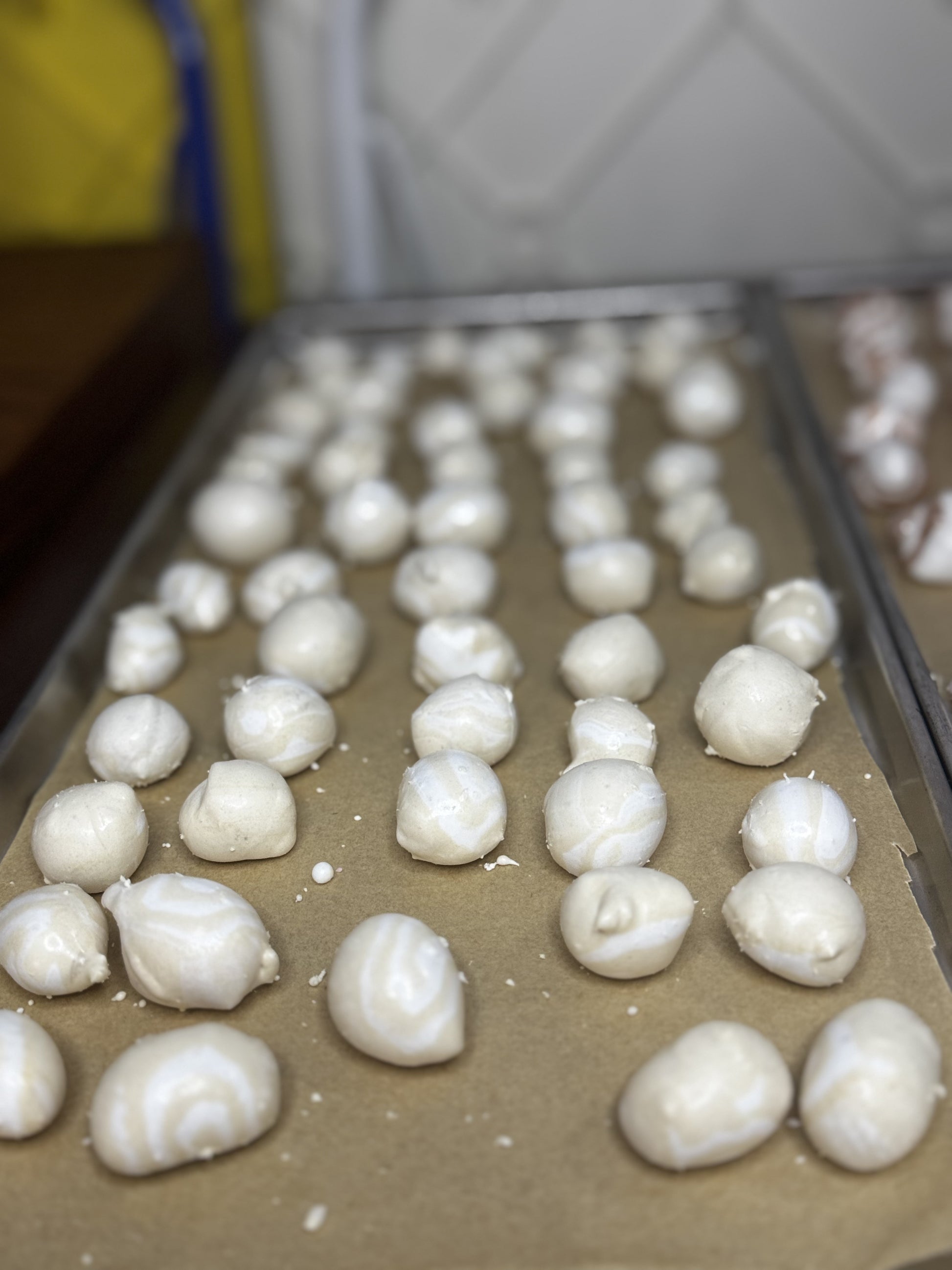 Freeze Dried Candy, displaying candy on tray, salt water taffy, cold brew coffee flavour